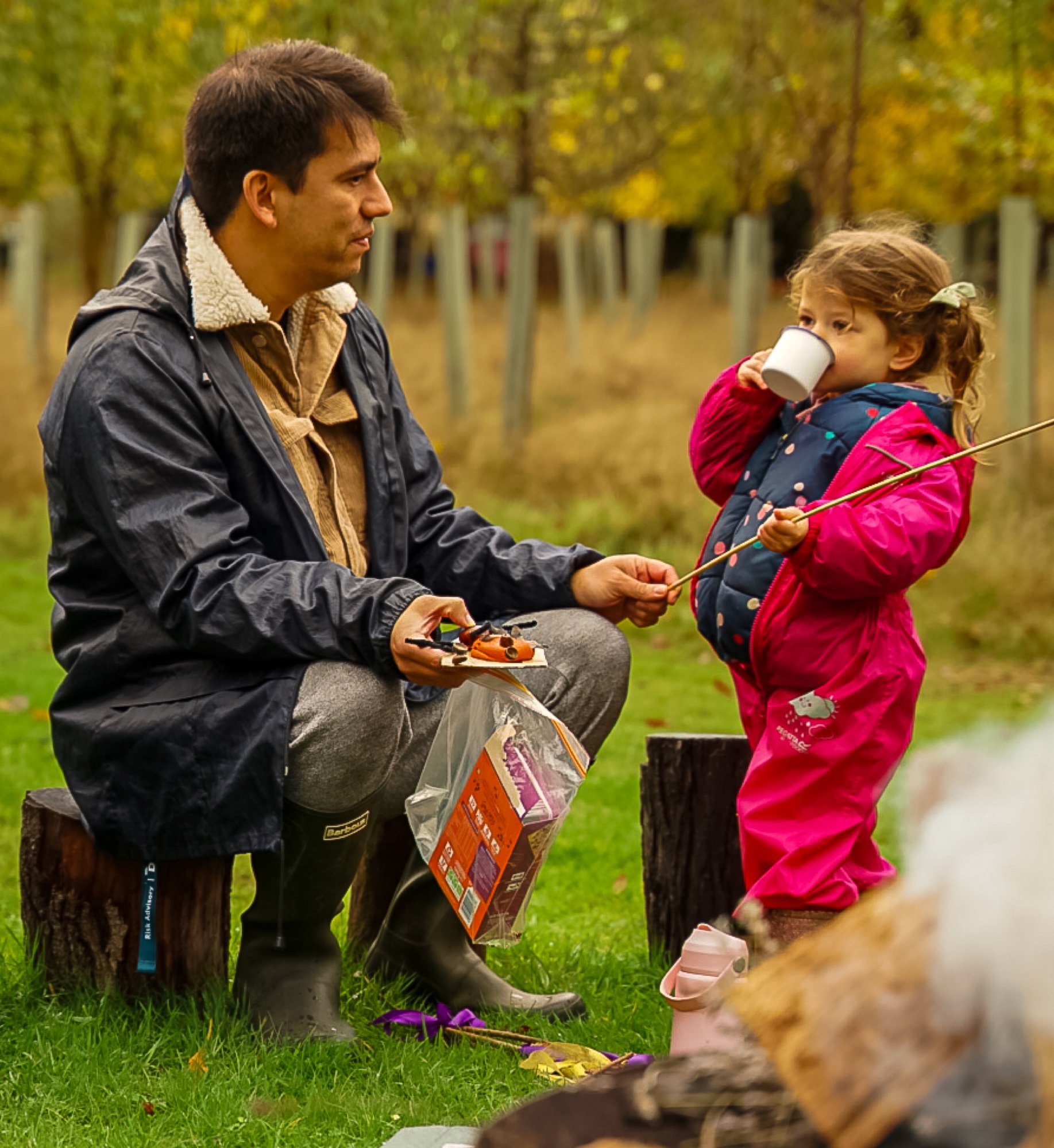 Candid moment of a child during an autumn outdoor family session