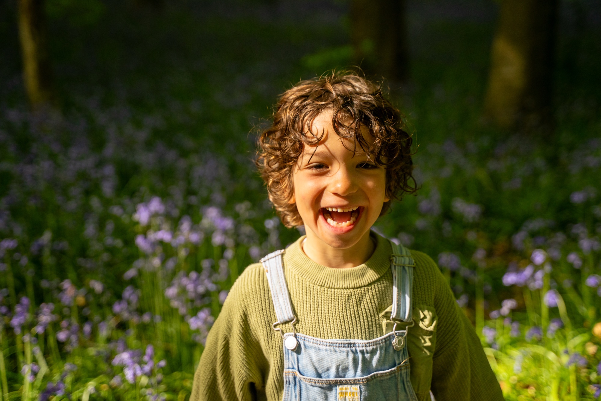 Couple portrait session among bluebells in Buckinghamshire